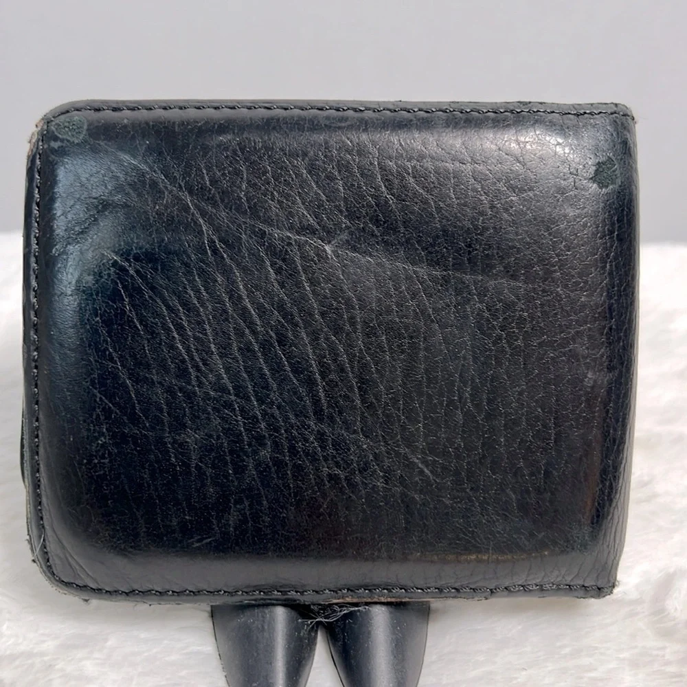 Tumi black leather